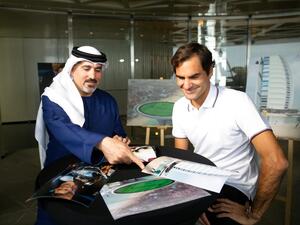 روجر فيدرر (يمين)