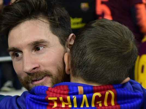 تياغو ووالده ليونيل ميسي