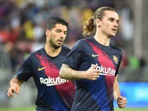 غريزمان (يمين) أمام فرصة لإثبات وجوده بعد إصابة سواريز