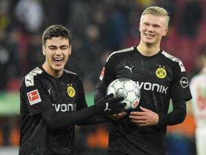 هالاند (يمين) يتألق في مشاركته الأولى مع دورتموند