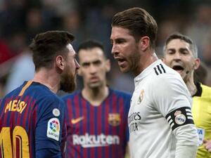 صورة أرشيفية لسيرخيو راموس قائد ريال مدريد وليونيل ميسي قائد برشلونة