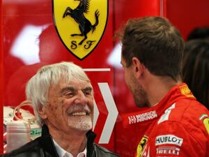 صورة أرشيفية لسيباستيان فيتيل (يمين) وإيكلستون