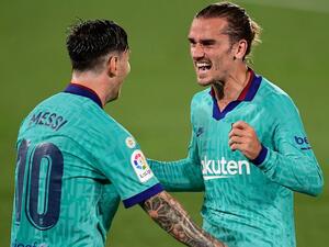 غريزمان وميسي