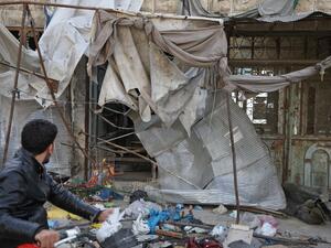 At least 12 people were killed and 18 others wounded in overnight strikes on the Idlib town of Maarat al-Numan, the Britain-based Syrian Observatory for Human Rights said. (Aaref WATAD / AFP)
