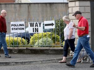 People leave and arrive at a polling station for the European Parliament elections at Bannside Presbyterian Church in Banbridge Co Down, northern Ireland, on May 23, 2019. (AFP)