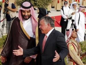 Jordan's King Abdullah (R) welcomes Saudi Arabia's Deputy Crown Prince and Defence Minister Mohammed bin Salman at the Royal Palace in Amman. (AFP)