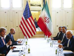 U.S. Secretary of State John Kerry, left, and Iran's Foreign Minister Mohammad Javad Zarif meet in Vienna, Austria. (Leonhard Foeger/AFP/Getty Images) 