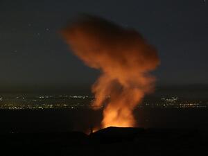 A fire rages and smoke billows following reported Syrian government forces' bombardment on the town of Khan Sheikhun in the southern countryside of Syria's Idlib province overnight on June 2, 2019. (AFP/File Photo)