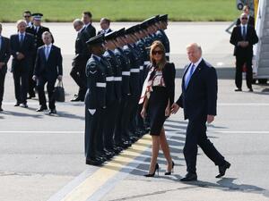US President Donald Trump (R) and US First Lady Melania Trump (L) walk to the Marine One helicopter after disembarking Air Force One at Stansted Airport, north of London on June 3, 2019. (AFP/ File Photo)