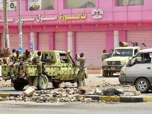 Sudanese soldiers stand guard a street in Khartoum on June 9, 2019. Sudanese police fired tear gas Sunday at protesters taking part in the first day of a civil disobedience campaign. (AFP/ File Photo)