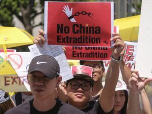 Protesters march during a demonstration to protest against a controversial extradition law proposed by Hong Kong's pro-Beijing government to ease extraditions to China, in Los Angeles on June 9, 2019. (RINGO CHIU / AFP)