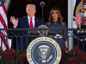 US President Donald Trump speaks alongside First Lady Melania Trump during the Congressional Picnic on the South Lawn of the White House in Washington, DC, June 21, 2019. (SAUL LOEB / AFP)