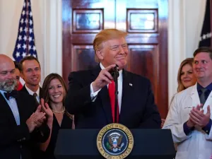 US President Donald Trump speaks before signing an executive order on "improving price and quality transparency in healthcare" in the Grand Foyer of the White House on June 24, 2019. (MANDEL NGAN / AFP)