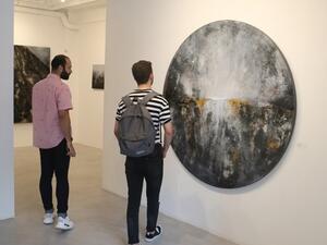 An installation view of "The Road," 2019, tire powder, shredded tires, gypsum and acrylic on canvas. (Photo The Daily Star / Azakir)