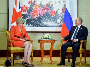 Russian President Vladimir Putin (R) meets with Britain's Prime Minister Theresa May on the sidelines of the G20 Leaders Summit in Hangzhou on September 4, 2016. (AFP/ File Photo)