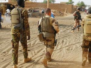 Soldiers from the Malian army patrol with soldiers from France's Barkhane Force in a street of Menaka. (AFP/ File Photo)