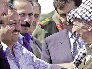 الراحل ياسر عرفات والاسير مروان البرغوثي 