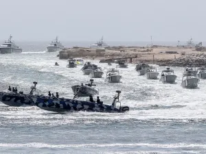 Qatar's coast guards take part in the inauguration ceremony of the new building of the General Directorate of Coasts and Borders Security, in Semaisima, 30 kilometres (18 miles) from Doha on the eastern coast on July 14, 2019. (AFP/ File Photo)