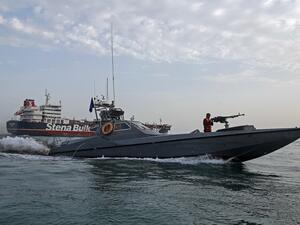 Iranian Revolutionary Guards patrolling around the British-flagged tanker Stena Impero as it's anchored off the Iranian port city of Bandar Abbas  (AFP)