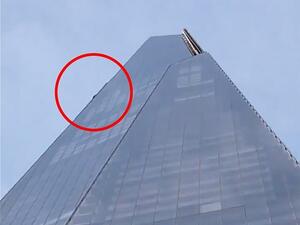 The climber managed to get to the top of the 95-floor building after scaling the 1,017ft skyscraper unhindered and without any ropes. (Twitter)