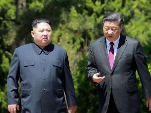 North Korean leader Kim Jong-un (left) and Chinese President Xi Jinping at their second meeting in six weeks in the Chinese city of Dalian. (AFP/ File Photo)