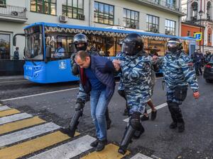 Servicemen of the Russian special police forces detain a man after a rally urging fair elections in central Moscow on August 10, 2019.  (AFP/ File Photo)