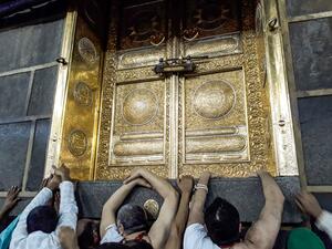 Muslims pilgrims gather outside the door of the Kaaba, Islam's holiest shrine, while performing the "Tawaf al-Ifada", a mandatory circumambulation during the annual Hajj. (AFP/ File Photo)