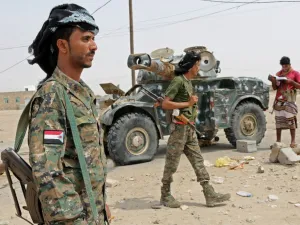 Fighters with the UAE-trained Security Belt Forces loyal to the pro-independence Southern Transitional Council (STC), gather near the south-central coastal city of Zinjibar in south-central Yemen, in the Abyan Governorate, on August 21, 2019. (AFP)