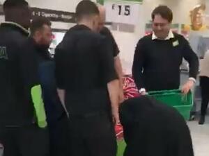 Five members of Asda security and staff crowded around the women as they were forced to reveal their spoils. (Daily Mail)