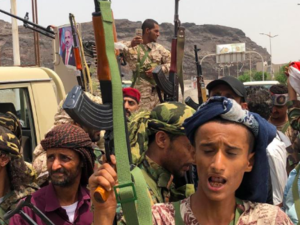 Yemeni supporters of the southern separatist movement pose for a picture in Khor Maksar, in the Yemeni southern port city of Aden on 10 August, 2019.