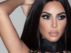 Kim also had on a light pink nail polish 