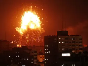 A ball of fire above the building housing the Hamas-run television station al-Aqsa TV in the Gaza Strip during an Israeli air strike on Nov 12, 2018. (AFP)