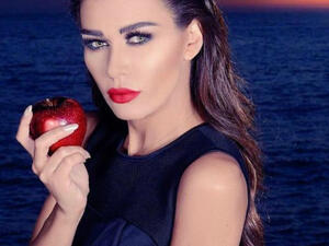 Nadine Al Rassi posted a picture of herself signing a new contract Source nadinealrassi Instagram