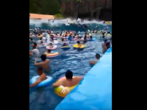 Footage taken by visitors shows swimmers deep inside the pool suddenly faced with a torrent of incoming water produced by the wave machine. (Twitter/Screenshot)