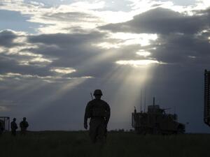 US Sergeant Andrew Warnerwalks to a Mine Resistant Ambush Protected (MRAP) vehicle in the village of Hasti in the province of Paktikain Afghanistan. (AFP/ File Photo)