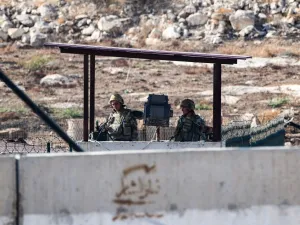 Members of the Turkish gendarmerie man an outpost along the border with Syria near the Syrian town of Atme in the northwestern Idlib province  (AFP)