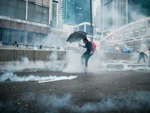Protesters react after police fired tear gas outside the government headquarters in Hong Kong on August 31, 2019. (AFP/ File Photo)