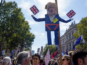 Demonstrators carry an effigy of Britain's Prime Minister Boris Johnson at a protest against the move to suspend parliament in the final weeks before Brexit outside Downing Street in London on August 31, 2019. (AFP/ File Photo)