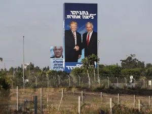 This picture taken on September 9, 2019 shows Israeli election billboards in the Israeli coastal city of Tel Aviv (R to L) for the Likud party showing US President Donald Trump shaking hands with Likud chairman and Prime Minister Benjamin Netanyahu  (AFP)