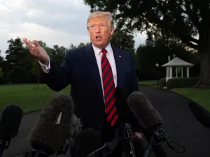 US President Donald Trump gestures as he speaks to the media prior to departing on Marine One from the South Lawn of the White House in Washington, DC, September 12, 2019. (AFP/ File Photo)
