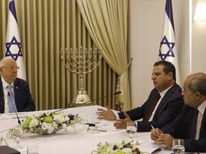 Israeli President Reuven Rivlin listens to members of the Joint List Ayman Odeh (2nd-R) and Ahmad Tibi (R) during a consulting meeting, to decide who to task with trying to form a new government, in Jerusalem on September 22, 2019. (Menahem KAHANA / AFP) Israeli President Reuven Rivlin listens to members of the Joint List Ayman Odeh (2nd-R) and Ahmad Tibi (R) during a consulting meeting, to decide who to task with trying to form a new government, in Jerusalem on September 22, 2019. (Menahem KAHANA / AFP)
