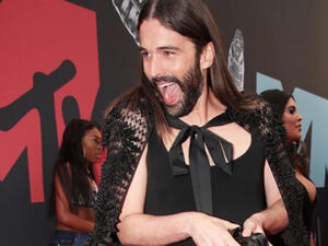 he is healthy now and regards himself as a "member of the beautiful H.I.V.-positive community."