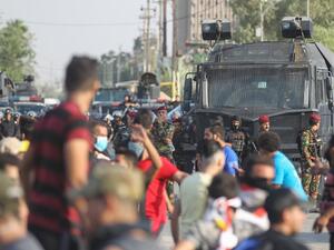 Iraqi security forces fired live rounds early today to break up protests help for a third day in Baghdad, an AFP photographer said, despite a curfew in effect since dawn. AHMAD AL-RUBAYE / AFP