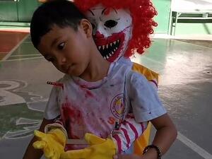 The six-year-old appears to be soaked in blood and has a spike piercing his shoulder for the Halloween costume which clinched him first prize. (Daily Mail)
