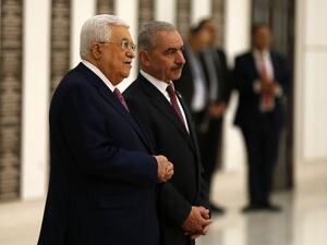Analysts say Palestinian president Mahmud Abbas (L) retains the real decision making power despite prime minister Mohammad Shtayyeh (R) forming a new government (AFP Photo/ABBAS MOMANI)
