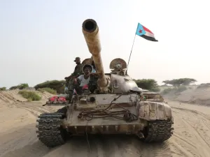 Fighters of the UAE-trained Security Belt Force, dominated by members of the the Southern Transitional Council (STC) which seeks independence for south Yemen, ride atop a tank in Yemen's southern coastal town of Shuqrah, east of the city of Aden, on August 27, 2019. (AFP/ File Photo)