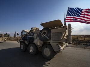 A convoy of US troops is pictured outside the Kurdish-majority city of Qamishli, in Syria's northeastern Hasakeh province on November 2, 2019. Delil SOULEIMAN / AFP