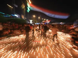 Iraqi protesters hold a candlelight vigil for victims killed during ongoing anti-government demonstrations in the Shiite shrine city of Karbala, south of Iraq's capital Baghdad, on November 2, 2019 Iraqi security forces clashed with anti-government protesters near the capital's Tahrir Square today as anti-government rallies which have rocked Baghdad for a month cost more lives. Mohammed SAWAF / AFP