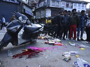 People gather at the site of a grenade blast at a market in Srinagar on November 4, 2019. At least one person was killed and 17 injured on November 4 in a grenade blast at a crowded market in Indian-administered Kashmir's main city of Srinagar, police and doctors said. Tauseef MUSTAFA / AFP
