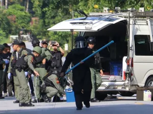Members of a bomb squad inspect the site of an attack by suspected Muslim militants in Yala province on November 6, 2019. At least fifteen people were killed and another four injured in attacks by suspected Muslim militants in Thailand's violence-wracked south, an army spokesman said on November 6, the largest death toll in years. TUWAEDANIYA MERINGING / AFP